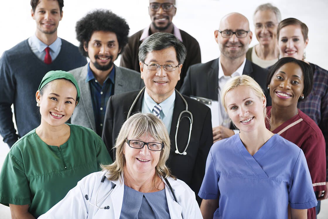 Group of medical professionals posing for a photo